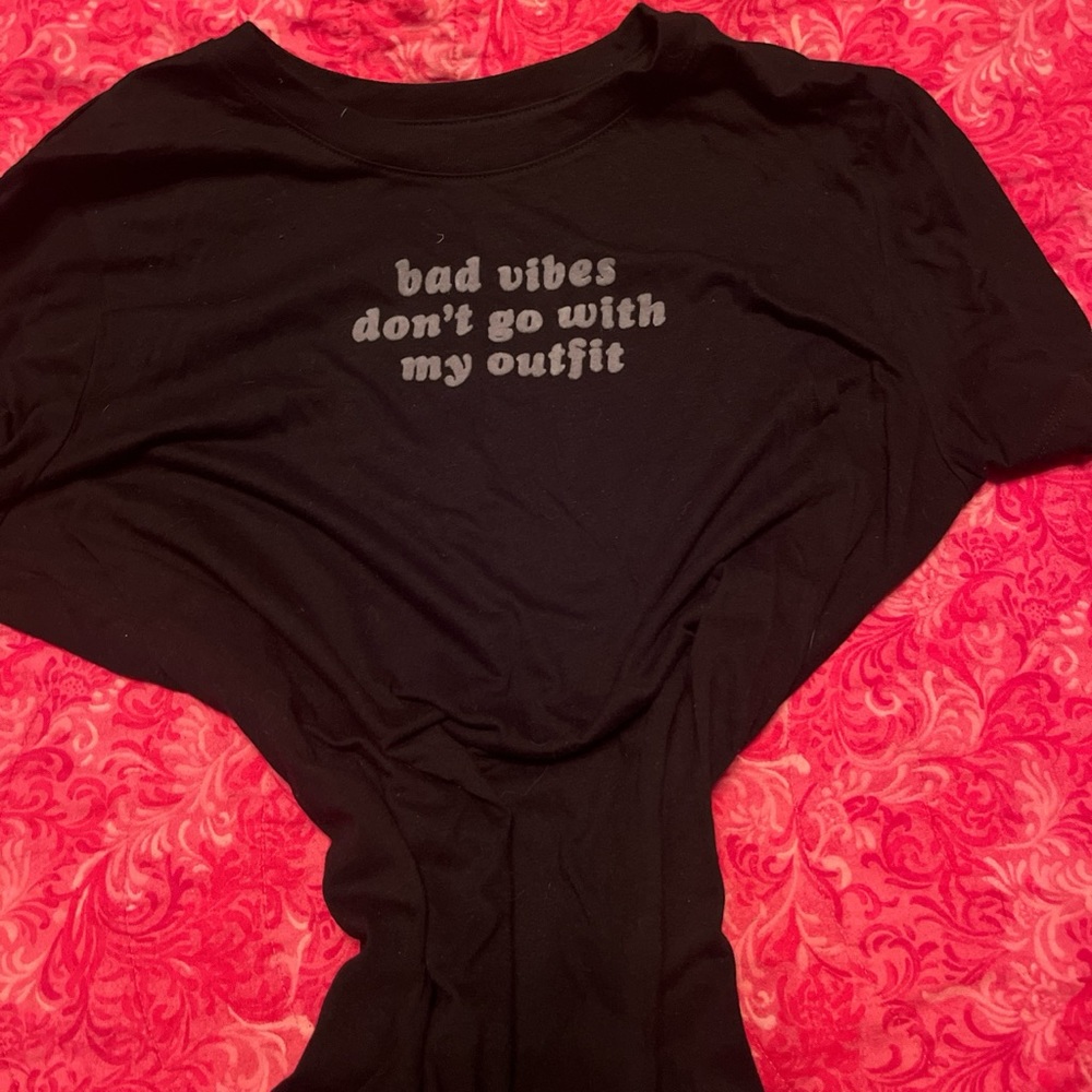 black logo shirt